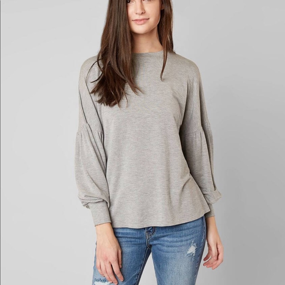 NWT. Women’s long sleeve top.